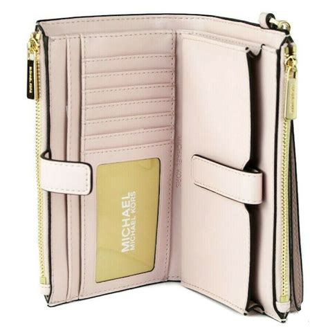 michael michael kors jet set large leather smartphone wristlet wallet|Michael Kors vanilla jet set.